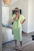 I waitlisted this dress for months and a small finally came in! It fits me perfectly just need a low plunge bra for additional supper. The color is super flattering for summer and it's just soooo flattering! One of my favorite Lulus summer dresses for sure! LOVE - Sarah T.