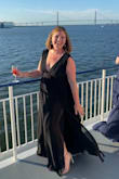 Love love love this dress! I got lots of compliments & wore it for my 40th birthday dinner. Fit like a glove, except for the straps. If you have a larger size bust, it will be perfect. Straps are not easily taken apart & sewn back because of layers & zig zag stitching, but I hand sewed it for a quick fix. Had to take up about 2-3 inches of fabric. Length of skirt is very long, but with at least 3 inch heals it's just dragging the floor. Flowy skirt & slit made it sexy & fun! Would be perfect for bridesmaids of different sizes, or to go to a wedding. - Amber F.