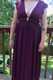 Loved this dress in general. It's very cute but the ties don't allow for the spacing to be closed. I thought it would be able to slide to tighten. The color looked very purple in natural light but more red-burgundy indoors. I had to return it because I needed a bridesmaid dress and didn't want to take chances with the color. If it were for anything else though, I would have kept it. I did have to size up from what I normally wear but I'm also sometimes between sizes so it's tough. Beautiful dress but didn't work out for my needs. - Casey R.