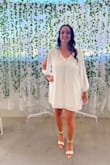 Ordered an XL which is my usual letter size. It fit perfectly. The material was nice, hung well, and wasn't see-through which I was worried about with an all-white dress. Had a liner in it. I wore this for my bridal shower and got soo many compliments! It was the perfect comfortable yet fancy dress. - Kayla P.