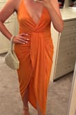 Love the material and fit. I think it hides some unflattering post-baby stomach. With some nipple covers and Spanx, I think we are good to go. Wedding guest attire on point! - Allison G.