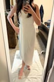 I purchased this dress for my small and simple wedding. It is beautifully made and doesn't need to be altered. It's slightly sheer, so I'll have to be careful with undergarment color. Very happy with my purchase! - Lauren W.