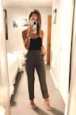 I am regularly an xs top, s bottom. These I could have swapped for xs but wanted the relaxed fit. I did have to have them hemmed a few inches as you can see they are folded up to where I want them length-wise. And I'm going to have the waist taken in a hair just so they sit more high-waisted. But worth it. Worth it! Beautiful brown trouser color as pictured. - Shana W.