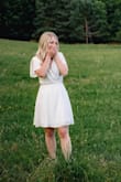 I purchased this dress for a photoshoot with my significant other, which turned into an engagement session because he proposed! This dress fit so well, was extremely comfortable and super cute. All of the ties on the dress allow for you to tighten/loosen it as you need which is nice. My only complaint is the dress is very see through, so you have to be careful with your underwear/bra colours. - Jennifer Y.