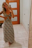 Got this dress for a beach wedding & it was perfect. Fit true to size for me. Straps are adjustable so I didn't have to wear a bra IYKYK. The wedding party jumped in the pool after the ceremony and this dress was the best material bc it dried within minutes lol. - Angelina B.