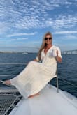 This was perfect for a breezy summer night on the boat. I wore this for my bachelorette and I got A LOT of compliments. I am now looking for more excuses to wear this beautiful dress. It runs a little large. I am a medium in everything and I had to return the M for a small. I think if you are taller than 5'5" though a small one would be too short. It was just right on me and I am about 5'5". - Meghan S.