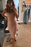 This dress fits like a glove, has a good stretch to it, and the length is elegant and classy. - Hattie J.