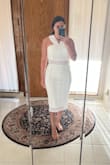 I got this dress for my bridal shower and I love it! I this its the perfect mix of elegant and fun! I originally ordered a small but I have wide hips so I exchanged it for a medium. The medium fit me perfectly! - Katelyn M.