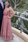 Absolutely loved this dress! Didn't need to wear a bra at all! I wore it to a wedding in San Diego in July and it was perfect! The grips on the top hold up very well! I will say I normally wear a size 4-6 so I originally bought the M. It barely zipped in the back so I'd definitely recommend sizing up automatically if you're bigger than a 32B. The large fit like a glove and I loved it!! - Morgan A.