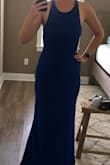 This dress is amazing! It's lined so I didn't even need to wear any shape wear which was a nice change from other dresses and a gorgeous color. This dress received compliments the entire night it was worn! The pictures do not do it justice - Alexandria P.