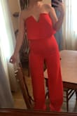 This jump suit is so perfect. Being short it was a little long but hemming wasn't too bad to make it fit the length I need. Accentuates the boobs! Love love love it. Can't wait to it to everything :))) I wore it for my brother's college grad and I can't wait to wear it to all other events - Miranda W.