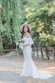 This is such a beautiful dress. I bought the dress and wore it for an engagement photo shoot. Get this dress if you are looking for a boho or rustic wedding theme. You will not regret. I got many compliments wearing this dress. - Meeso L.