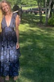This dress was so fun!!! I ordered a size small and it fit comfortably, with some wiggle room. The low cut in the front was tasteful. I didn't feel like I was going to "slip out". It has some weight to it making it fall nicely. I received many compliments which always feels nice ) - Elise G.
