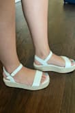 These are cute but the top strap on one of the shoes left a cut on my big toe. May have been that I was wearing them too tight, but not very comfortable to wear if you're going to walk around a lot. - Adriana M.