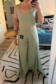 You can wear either part as a separate and works for dressing up or down. The skit on the legs isn't super obvious, when you walk it opens a bit but is easy to keep together. The pants were pretty long so I had to get them hemmed. - Stephanie B.