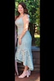 I loved wearing this dress to a friend's wedding this spring. Since the outside layer is lace, it doesn't have any stretch, so keep that in mind when ordering your size; if you're between sizes order up. I got a ton of compliments and it was different than any of the other dresses the guests were wearing. A great piece to add to your wardrobe that will make you stand out! - Kelly D.