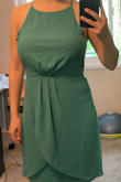 The dress is very pretty but it was too tight around the bust while strangely loose around the neck.  It might have helped if the straps were adjustable.  The pleating in the front also hangs a little weird.  The color is a little lighter than in the picture but still very nice. Overall just not for me. - Mari S.
