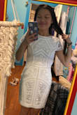 I am stunned by this dress. I'm wearing it for my wedding reception and it fits like a dream. My bridesmaids and friends who've seen it absolutely love it. Not the most flattering photo (it makes me look like a box) but is much more figure-flattering in person! - Claire S.