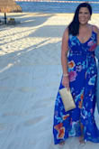 I wore this dress to a destination wedding in Mexico and received so many compliments!! I am typically an XL in Lulus but went with the L due to the wrap style and extra material in the bust. It is very comfortable and I wore a strapless bra easily. I am about 5'8 and the length was perfect with flat sandals. I definitely recommend (and order a size down)! - Shannon P.