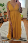 Ordered this for a formal, Indian wedding, as I wanted a nice bright color. This is definitely more on the mustard side, better for a fall wedding. Got an XL based on the size guide and it's a little big overall; I don't mind the waist being a little loose but the bodice is super long so I had to adjust that (thankfully I can do alterations myself). A lot of fabric/coverage at the top so I opted to make little knots and go with a more Grecian look. The length is nice and long and perfect with my 3" heels. Not my #1 dress ever, but since I don't have time to try something else, it'll do. - Lena N.