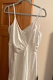 This jumpsuit is really comfortable and pretty. It's a much higher quality fabric than I expected. If I could change anything I would make the legs just a little longer, but I'm a taller gal so I can live with it. - Grace D.