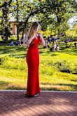 I bought this dress to wear to a wedding and it was perfect! Super comfortable, a little stretchy but nothing crazy. I got so many compliments and the quality is great, I'm considering ordering it in other colors. I'm also tall and was worried about the length ordering a small but it worked great even with my heels on! - Morgan W.