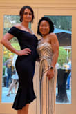 I wore it to a formal party that was 'dress to impress.' Most women were in super expensive, designer dresses but my $60 dress looked like a million bucks and I've never gotten so many compliments! It fits true to size, and does ride a tiny bit but I definitely wasn't tugging it down all night. Get it, you won't regret it! - Bonnie R.