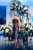 I ordered the small to be safe, knowing that it would require alterations. The fabric was great for travel - the dress looked elegant and sophisticated for an upscale wedding. Perfect dress for the occasion. - Adrienne V.