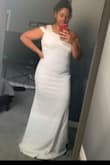 The dress design is beautiful but unfortunately, it didn't look good on me. It was tight in the stomach area and not really flattering. - Kesha M.