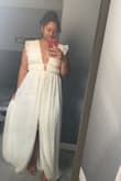 This dress was beautiful and flowy. I would wear for beach elopement but I had to return because it bc I needed a dress for the courthouse instead. The vneck was flattering; I just didn't like the cream color. - Kesha M.