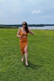 This dress can be dressed up or down. It was perfect for my friend's bachelorette. It's a bit thick material-wise but not too much where I was overheating. - Gina M.