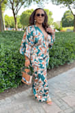 I felt amazing in my jumpsuit and received so many compliments! I initially wanted this a couple of months ago and it was out of stock! Thank goodness it came back in stock right before my trip. Two-day shipping and it was definitely worth it! The perfect length, the perfect fit, I mean, just perfect all around. To be honest, a lot of times I'm a "one wear and done" kind of girl, but this one is definitely going to be seen again!! And again! If you're having doubts about purchasing, don't! Buy the jumpsuit and thank me later. - Angela H.