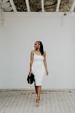 This dress was absolutely perfect for my graduation pics. It's lightweight, classy, and figure-friendly. - Brittnea J.