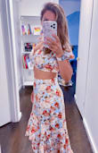 Love this set for my upcoming party. The material is not stretchy but it has elastic material in the back of the top. fits true to size. Feels soft on my skin and the colors and print are beautiful without being too loud. Skirt is a little long I am 5 feet 3 in but some high wedges will suffice. Love the fit and style. I order a medium on the top and maxi skirt because  I didn't want it too tight around my waist. Overall, definitely Recommended. - Magaly P.