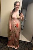 I bought this dress to wear as a bridesmaid at my sister's wedding. It was in San Diego in the middle of summer, so it was a hot day. If there was a breeze this dress would have been perfect, especially with the slit. But even so, the dress was amazing as is with thick material, so it's not see-through. That being said it does make the dress a bit heavy, something to keep in mind. For being on the taller side at 5'8" I did appreciate how long it was, so when I put heels on it was the perfect length. I did use double-sided tape for the bust area but that was just for my own peace of mind. (Pictures were taken at the end of the night). - Tori W.