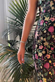 I love the dress so unique so classic I love the material and fits right to size - Saly R.
