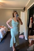 It fit, but has no give at all - absolutely zero stretch. Made it very uncomfortable to wear for the whole wedding day/night. Got lots of compliments but I probably won't wear it again. - Rachel S.