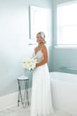 I normally wear a size 6 but needed an 8 due to bust area. It was very comfortable and fit perfectly with only needing to alter the length since I was not wearing shoes for a beach wedding. Loved this dress and wish I could wear it again!! - Sierra P.