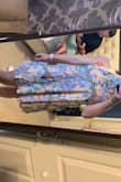 absolutely love this dress - pattern is beautiful, i know it's supposed to be flowy but i think i would prefer if it was slightly more fitted in the waist/hip area - Nicole R.