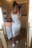 This dress is AMAZING!! I am not one who would ever buy a tight dress but this one hits you in all the right places. It's so beautiful! My only thing would be that there is a flappy piece of fabric that is over the breast area that is not advertised. It's not a big deal but it's definitely noticeable. - Alyssa M.