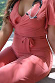 I loved it!! I used it for my white coat ceremony and it was the perfect mix of casual elegance. The top was a bit big on me because I am more like a pear shape but not a huge noticeable difference, I wanted to make it tighter so a safety pin in the back did it for me. I still loved how it shaped my body. It was long for me as well because I am short but with 5" heels was fine. - Vanessa L.