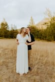 Ordered this for my engagement photos, turned out beautiful! It was light enough when it was 90 degrees out, and very flattering! - Amy H.