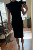 I wore this dress to meet my boyfriend's very conservative family for their grandmother's funeral. The dress fit perfectly and the sleeve ruffles gave it that chic-high fashion- classy- vogue look. My hair was worn down to cover the open part of my back so I didn't show too much skin in church. I Loved it and will def wear it again in the future. - Kasey H.