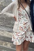 This dress looks so much more beautiful in person than it does in the photos. I love the print and the material is really comfortable. I've owned many wrap dresses but this one is by far the most flattering. - Nabila A.