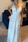 This dress is beautiful! The quality is amazing for the price point! However, I'm returning it because I realized it's not preferred my style. The spaghetti strap isn't as complementary to my body shape which is bigger hips and smaller shoulders. Planning to order another Lulus dress with a sleeve. - Lauren W.