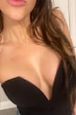 I loved this top. I ordered a small and it fits beautifully. Not too tight but fitted. A lot of eyes and compliments. We went out dancing and I did need to pull it up a few times but I assumed that was because I was jumping and moving around so much. Would buy it again! - Angela M.