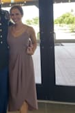 I love this dress and the color. I originally ordered a small which fit perfectly but was too small in the bust area. I then ordered a medium and it was a little big but fit perfectly in the bust and I was much more comfortable. - Kelly S.