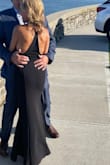 Purchased last minute for a formal wedding. It was beautiful, fit great and very sexy. My only complaint is the side zipper has an extra piece of material that stands out. - Debbie M.