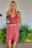 This dress is perfect for almost any event...wore this through Louisville for bar crawl and bourban tours. Perfect material...soft and flowy. After reading reviews, I ordered a size down (xs) from my usual size small...fit perfect. Fun, and sexy. - Amy O.