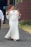 This was perfect for my small vow renewal. It was comfortable and it went perfectly with the caplet I bought! (caplet was from Tadashi shoji and matched perfectly). Super easy to get on! I would size up! I normally wear a XL but that was tight. So I ordered a 1X. 

My only complaint is that if the dress touches the ground (Grass/outdoor venue) the lace catches everything!!!!! I mean I had twigs dragging in the hem. But if you keep on heels then no worries. Other great points- it gives you a nice waist. Scallop edging pretty. - Kim T.